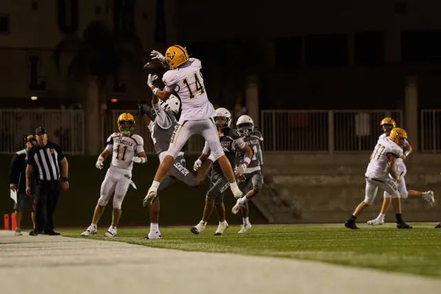 Temecula Valley’s WR Beckett Aaron #14, can’t come up with the sideline catch that was disrupted by Paloma Valley’s secondary