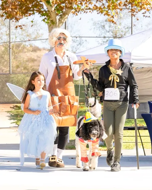 Participants and their pets braved unseasonably warm October heat in full costumes during the annual Dog Daze Canine Festival at Aldergate Dog Park in Menifee on Saturday, October 3.