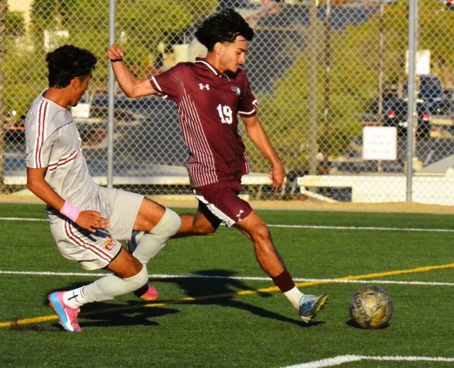 A Victor Valley shot on goal eluded Norco College Goalie Julian Luevanos, but it clanged off the sidebar during the Mustangs 3 – 1 win.
Cred: Photo by Gary Evans
