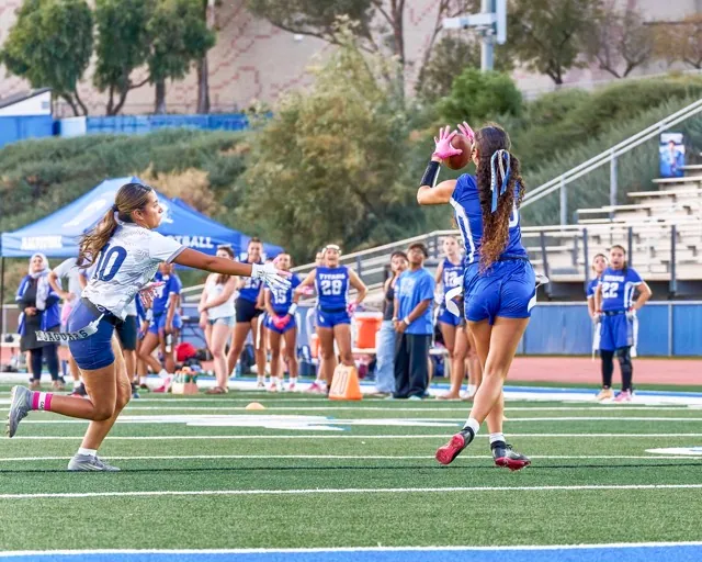 Temescal Canyon’s Leila Ortiz (#18) comes up with a reception that she take to the endzone to push Temescal Canyon further ahead.