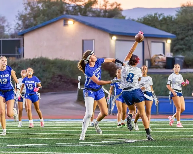 Temescal Canyon’s Reagan Pickens (#5) disrupts a pass intended for Jurupa Valley’s #8.